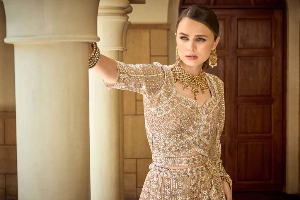 seema gujaral Beige color Reception wear VIRAL designer lehenga choli...