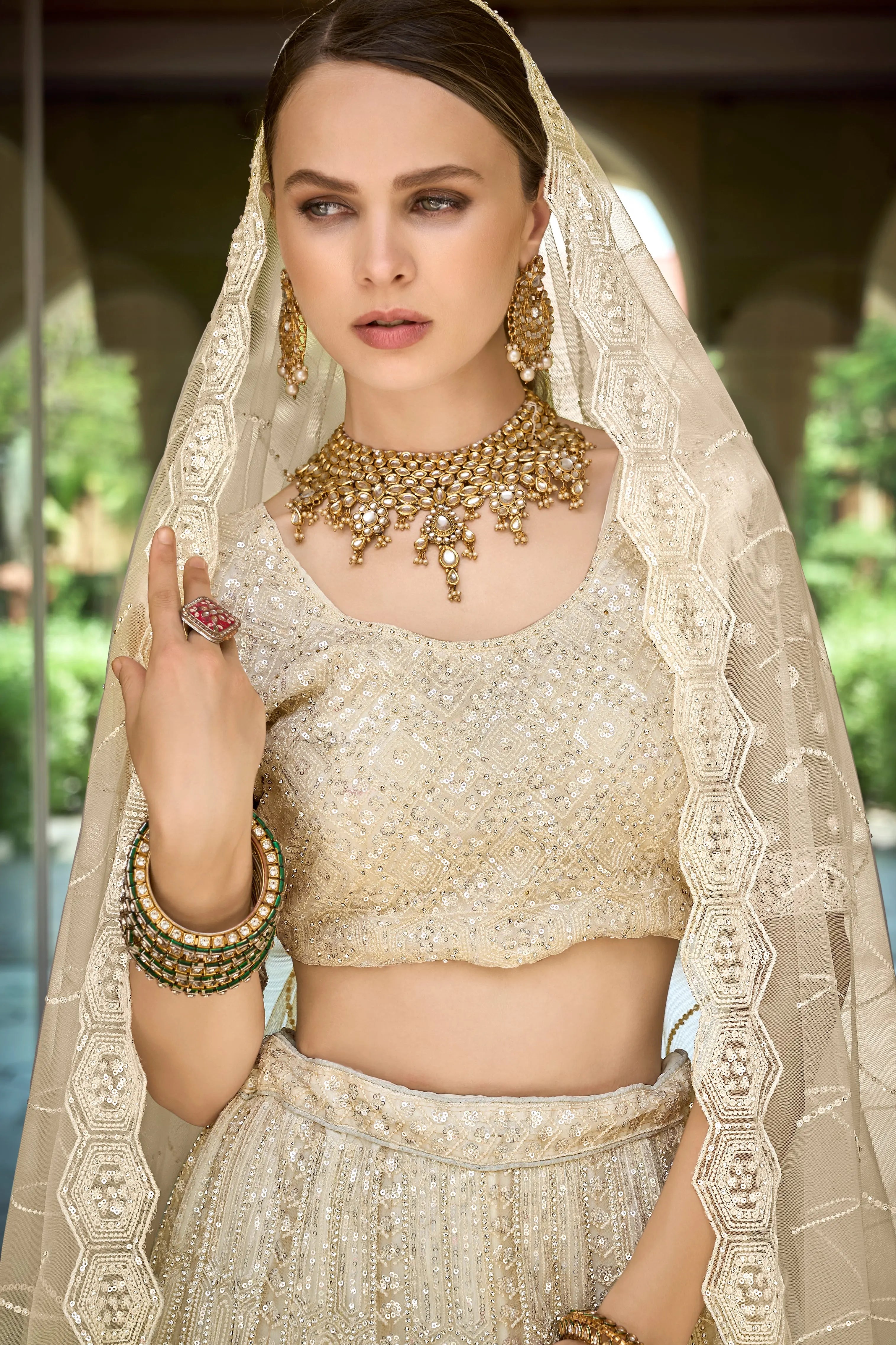 off-white nett party wearstunnig lehenga choli,, for reception wea...for 2026 bride....and girlish wear also....