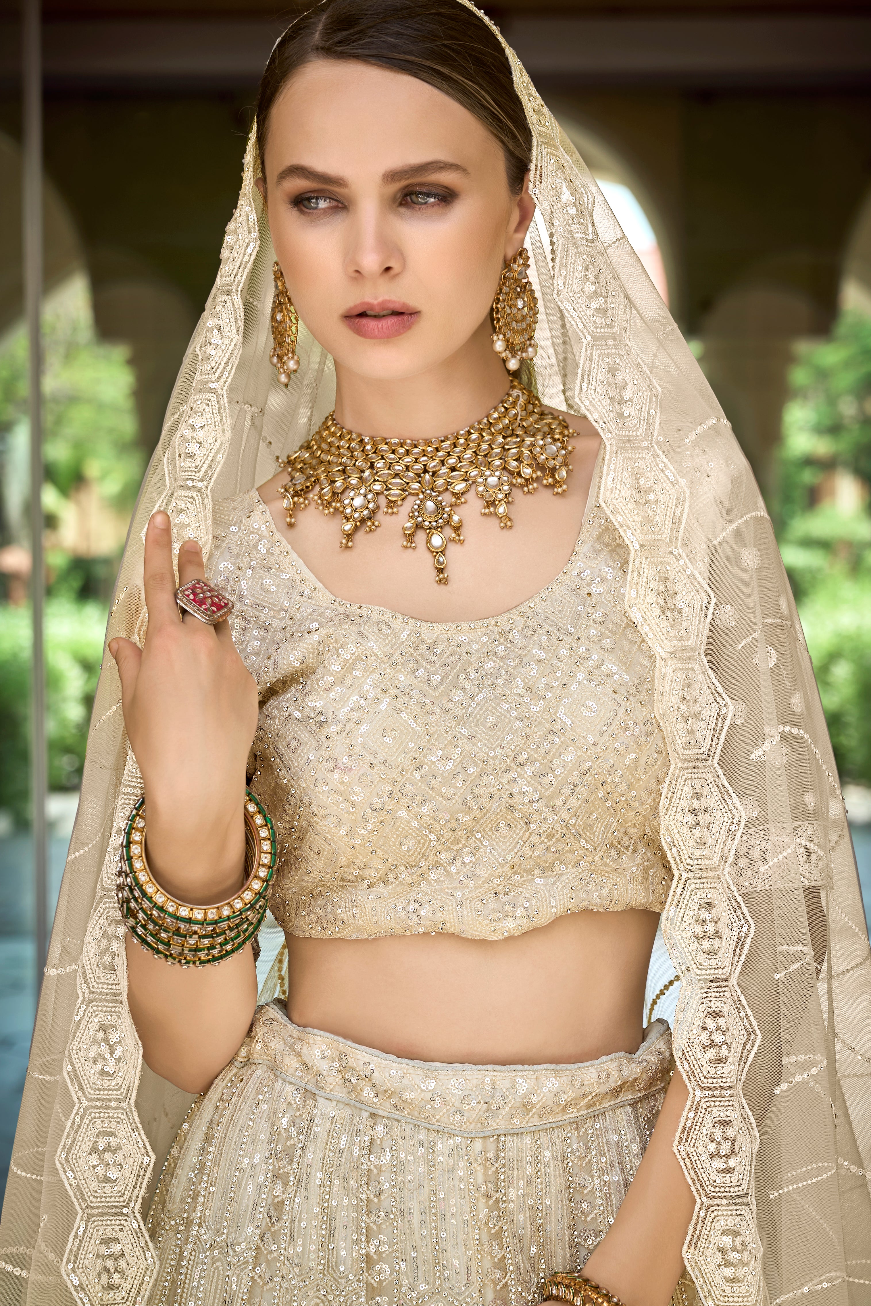 off-white nett party wearstunnig lehenga choli,, for reception wea...for 2026 bride....and girlish wear also....